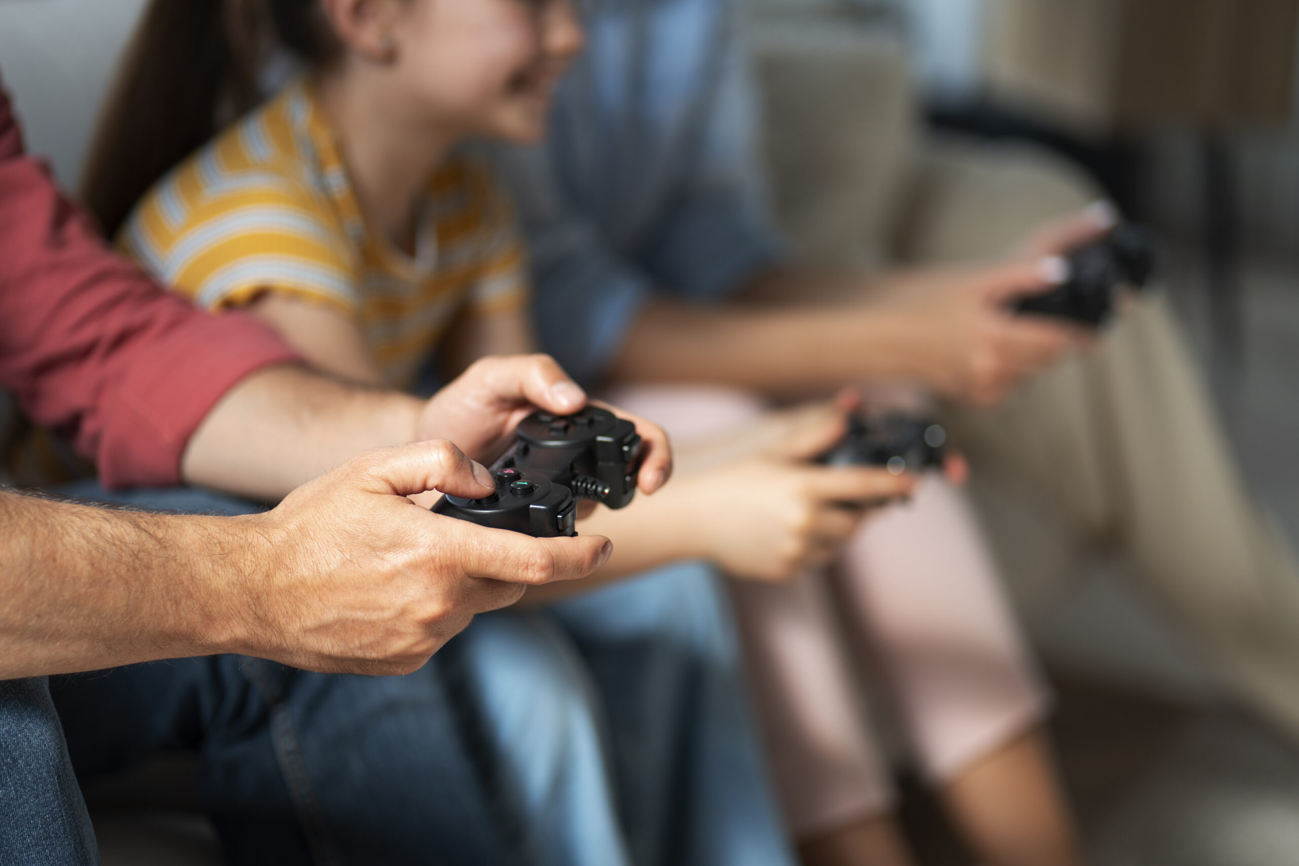 side-view-family-playing-videogame